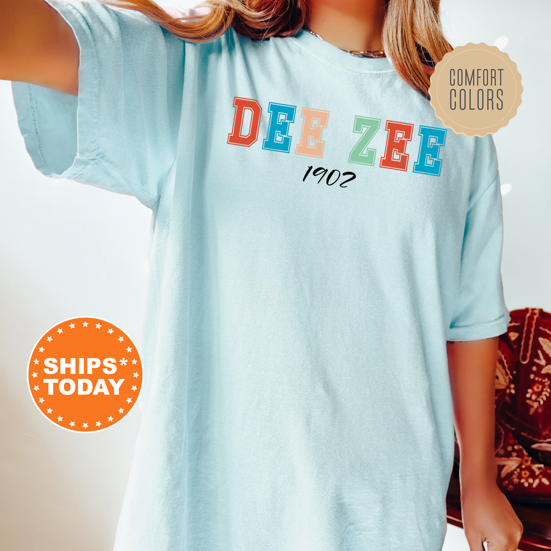 a woman wearing a t - shirt with the word dezeb on it