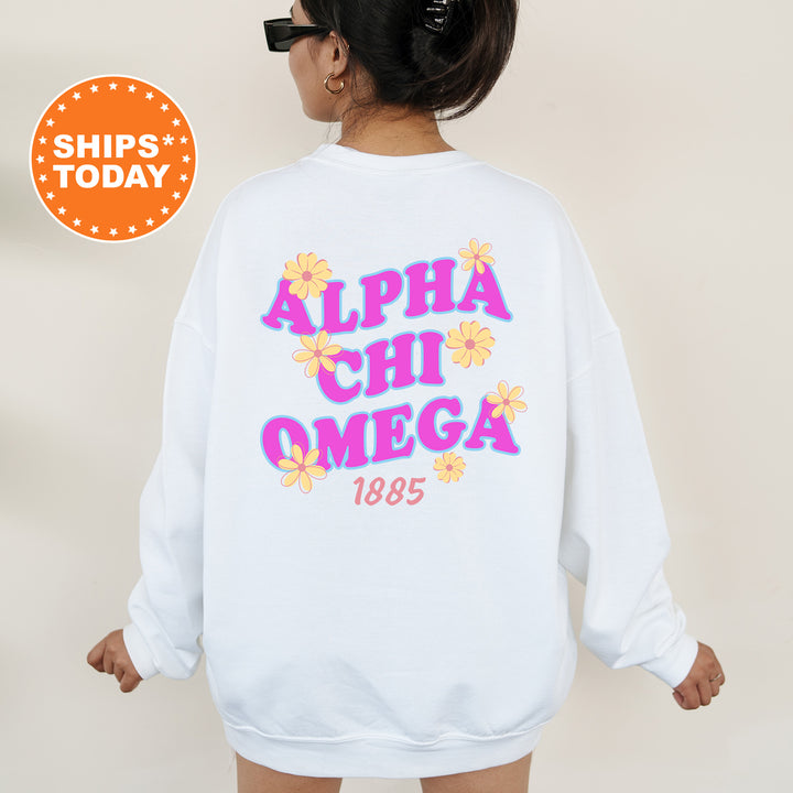 A person wearing a white sweatshirt with the text "ALPA CHI OMEGA 1885" printed on it.