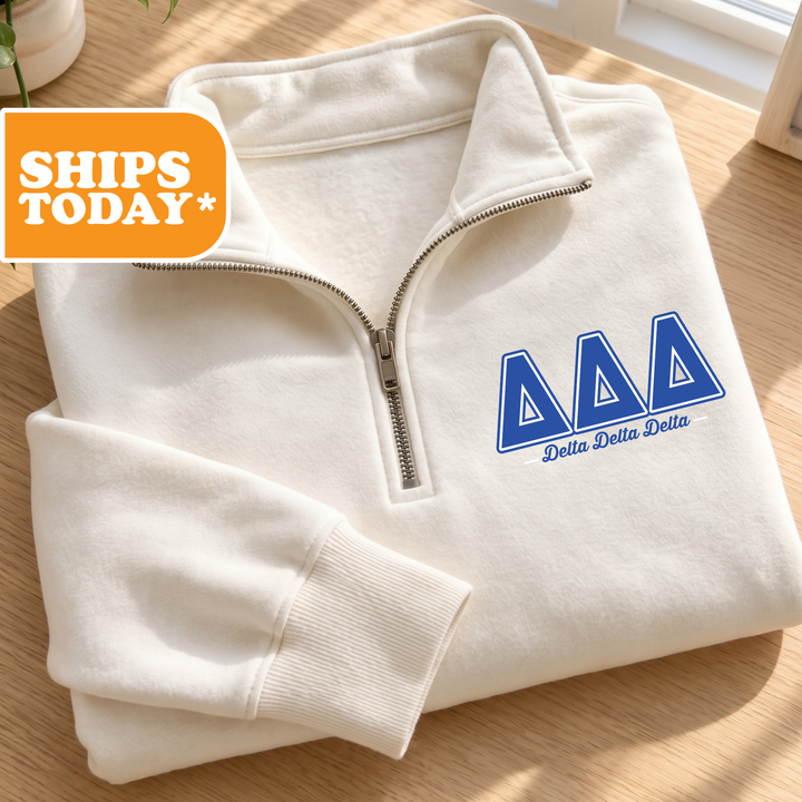 A white zip-up jacket with a blue logo on the left chest area, placed on a wooden surface.
