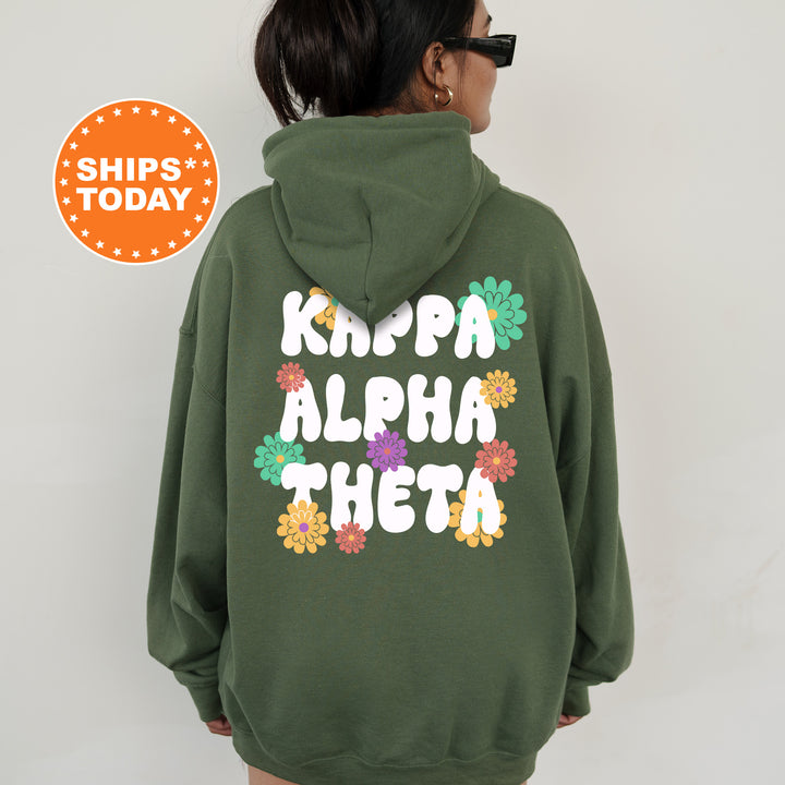 a woman wearing a green hoodie with the words kripa aloha