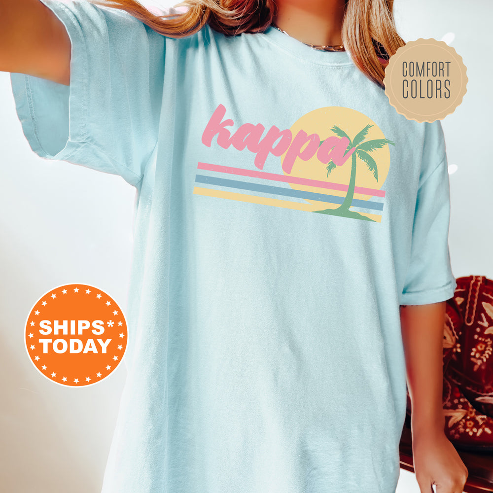 a woman wearing a t - shirt that says happy with a palm tree on it