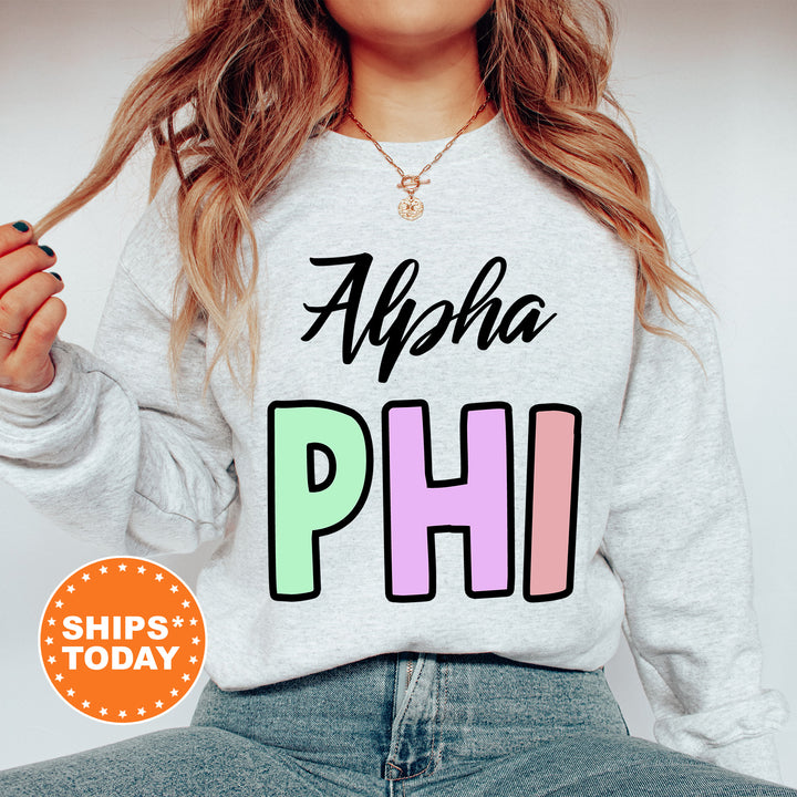 a woman wearing a sweatshirt that says aloha phi