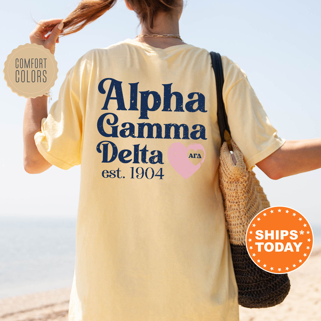 the back of a woman's shirt that says, alpha garma delta