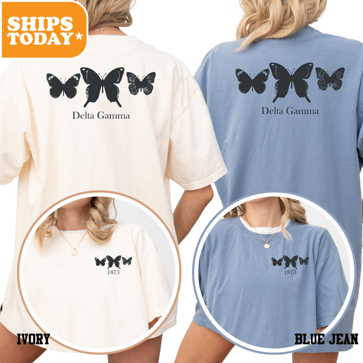 a woman wearing a blue and white tshirt with butterflies on it