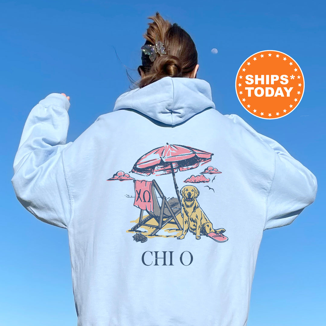 a woman wearing a white hoodie with a picture of a dog on it