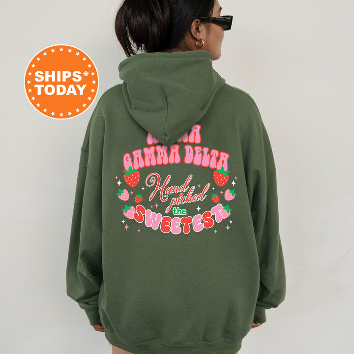 a woman wearing a green hoodie with the words grandma dear on it