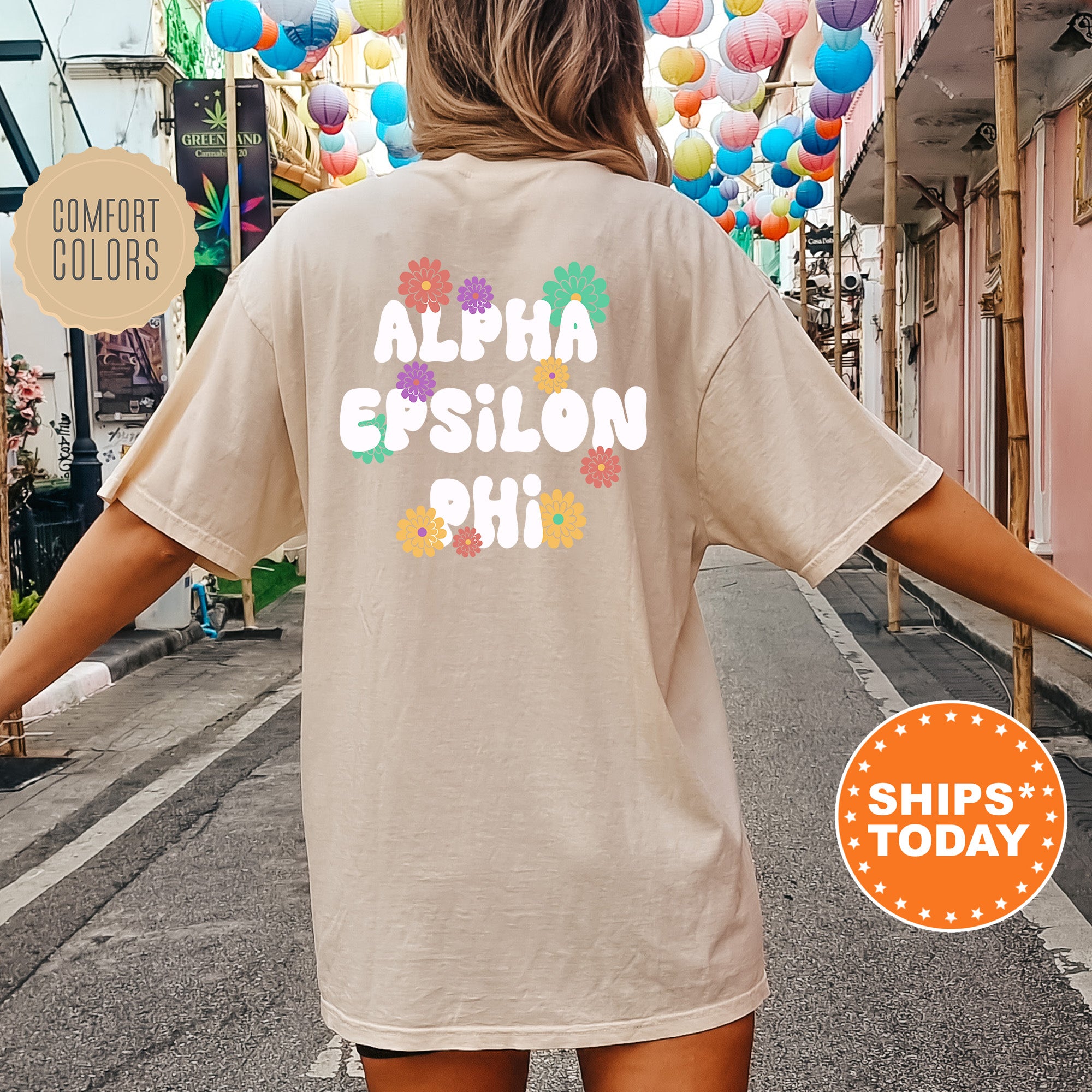 a woman walking down a street with balloons in the background