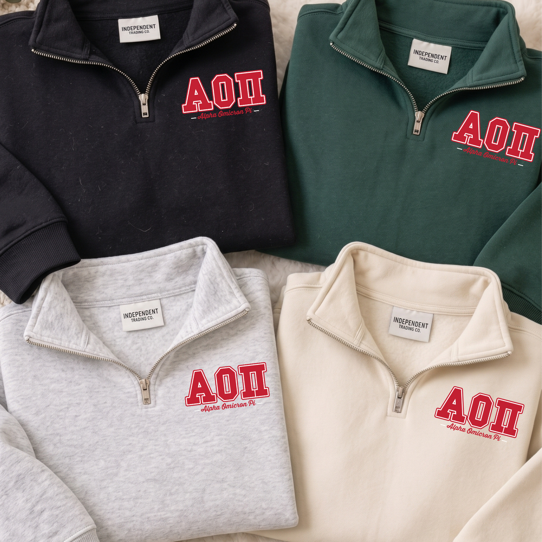 Four different sweatshirts with the letters "AOI" printed on them, arranged in a row.