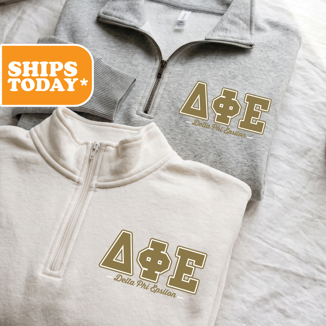 Two gray sweatshirts with gold Delta Phi Epsilon (D Phi Epsilon) logos are displayed on a white background.