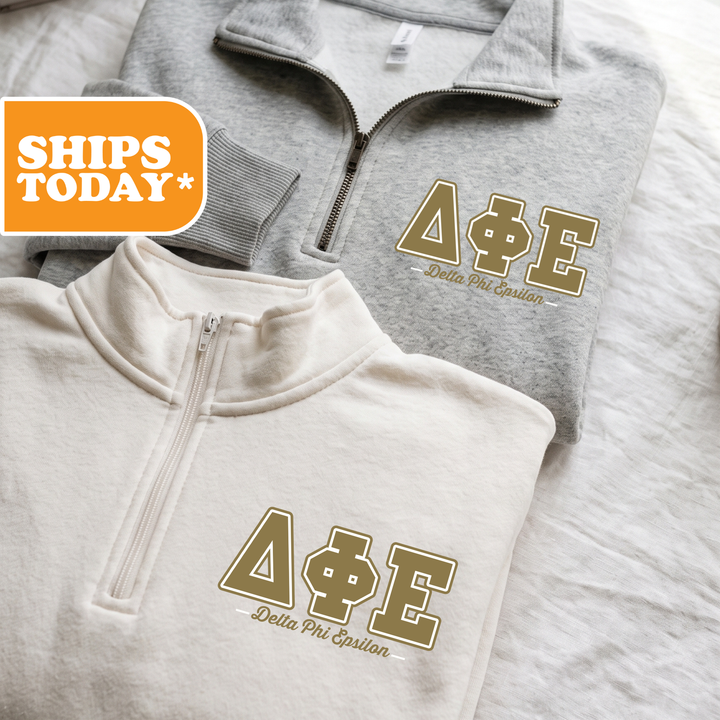 Two gray sweatshirts with gold Delta Phi Epsilon (D Phi Epsilon) logos are displayed on a white background.