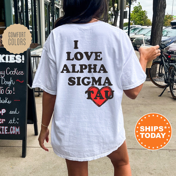 a woman walking down a sidewalk while wearing a white shirt