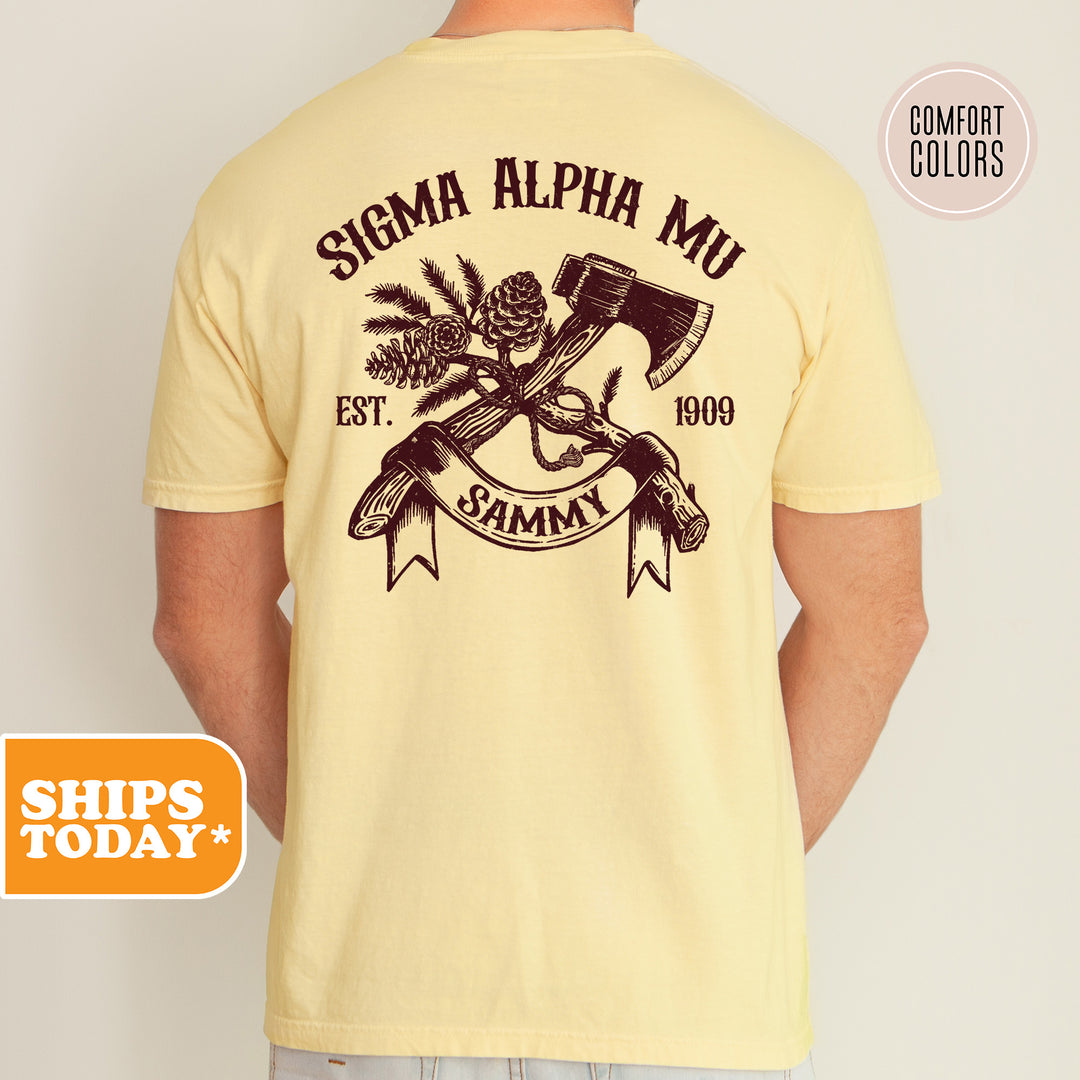 a man wearing a yellow shirt with an image of a hammer and a skull on