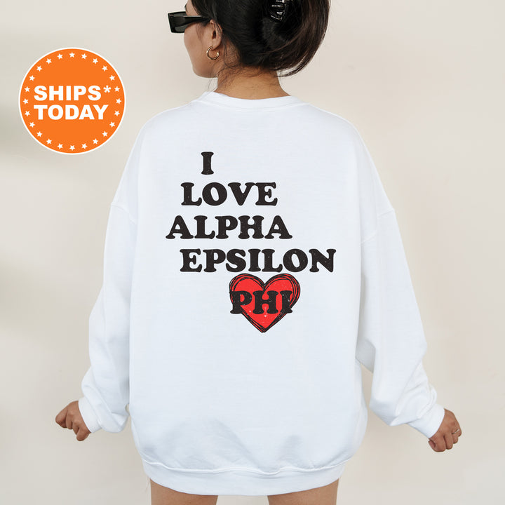 a woman wearing a sweatshirt that says i love alpha epiloon