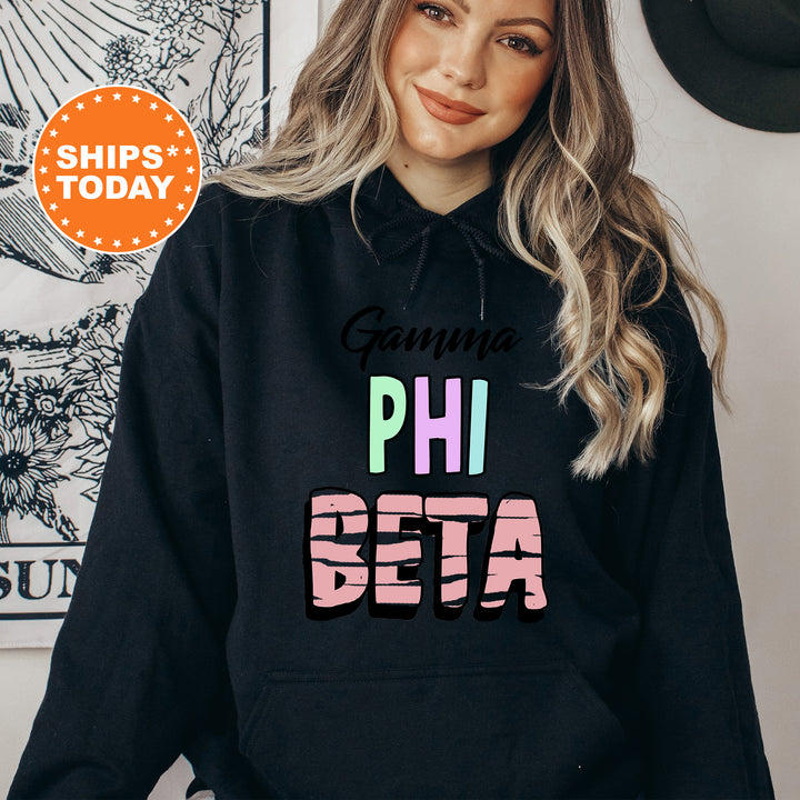 a woman wearing a black hoodie with the words phi bea on it