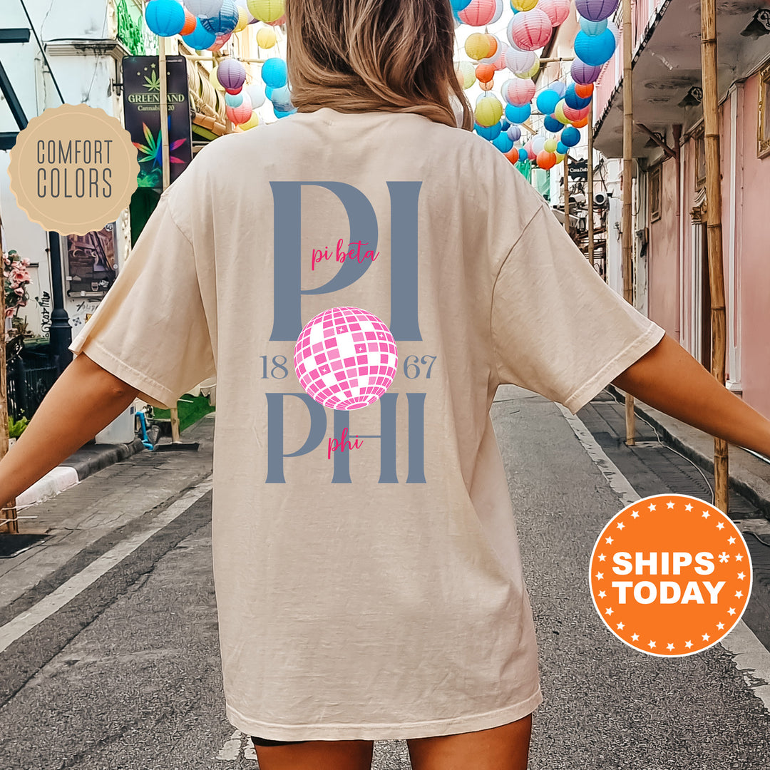 a woman is walking down the street with a t - shirt on