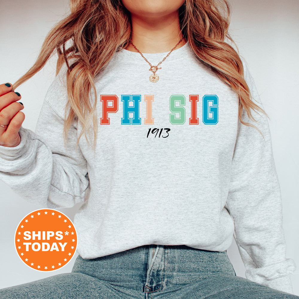 a woman wearing a sweatshirt that says phi sig