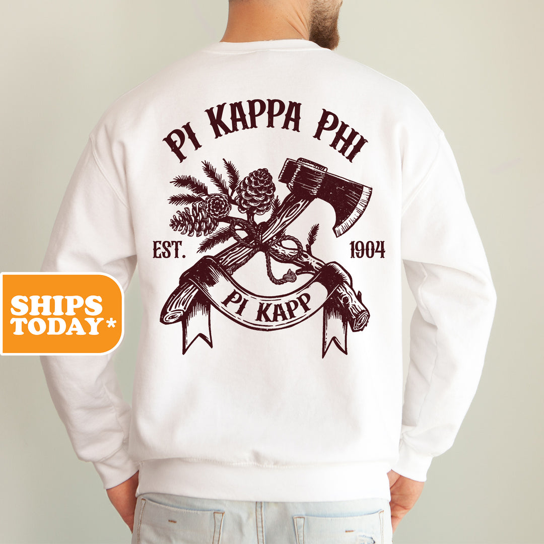 a man wearing a sweatshirt with a hammer and crossed axes on it