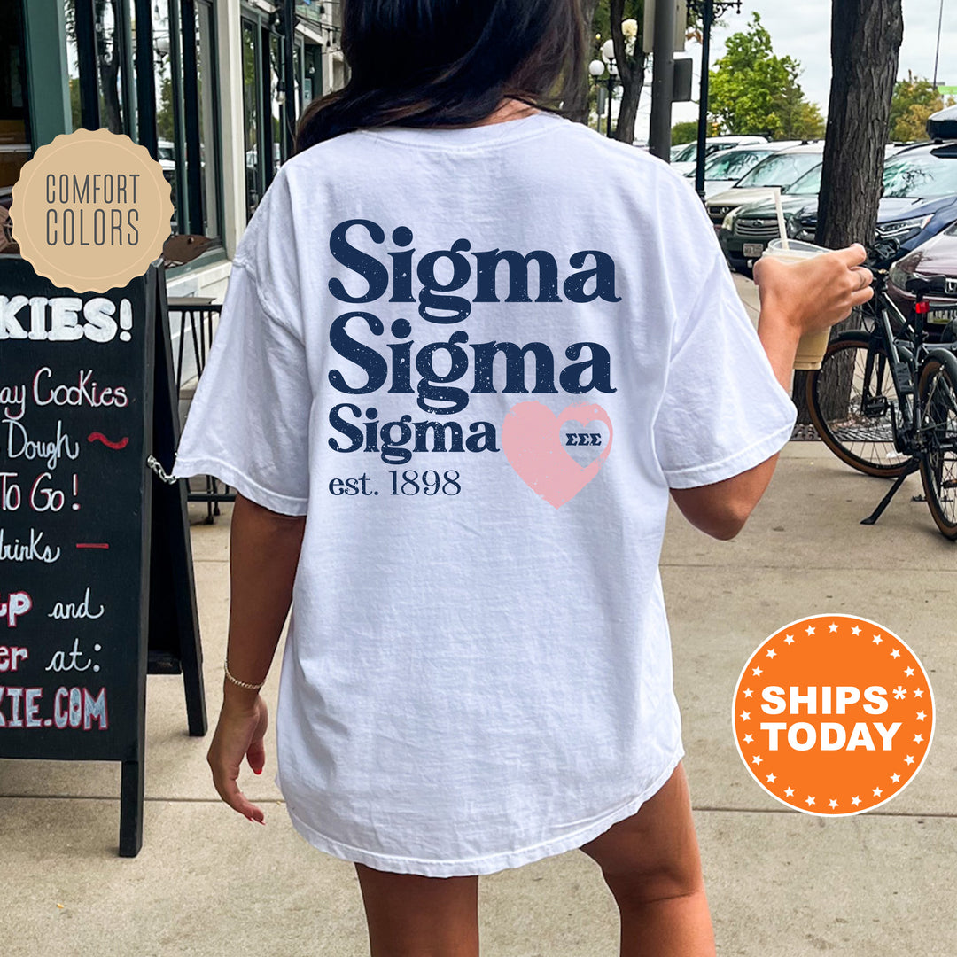 a woman walking down a sidewalk while wearing a white shirt