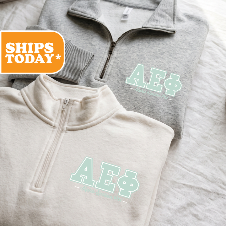 Two gray and white sweatshirts with the letters "AE" printed on them, along with a "SHIPS TODAY" logo.