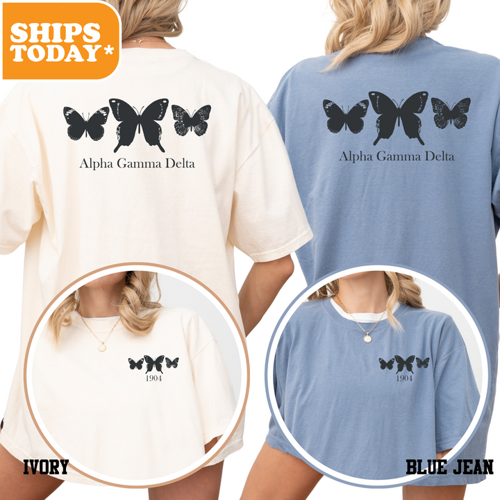 a woman wearing a blue and white tshirt with butterflies on it
