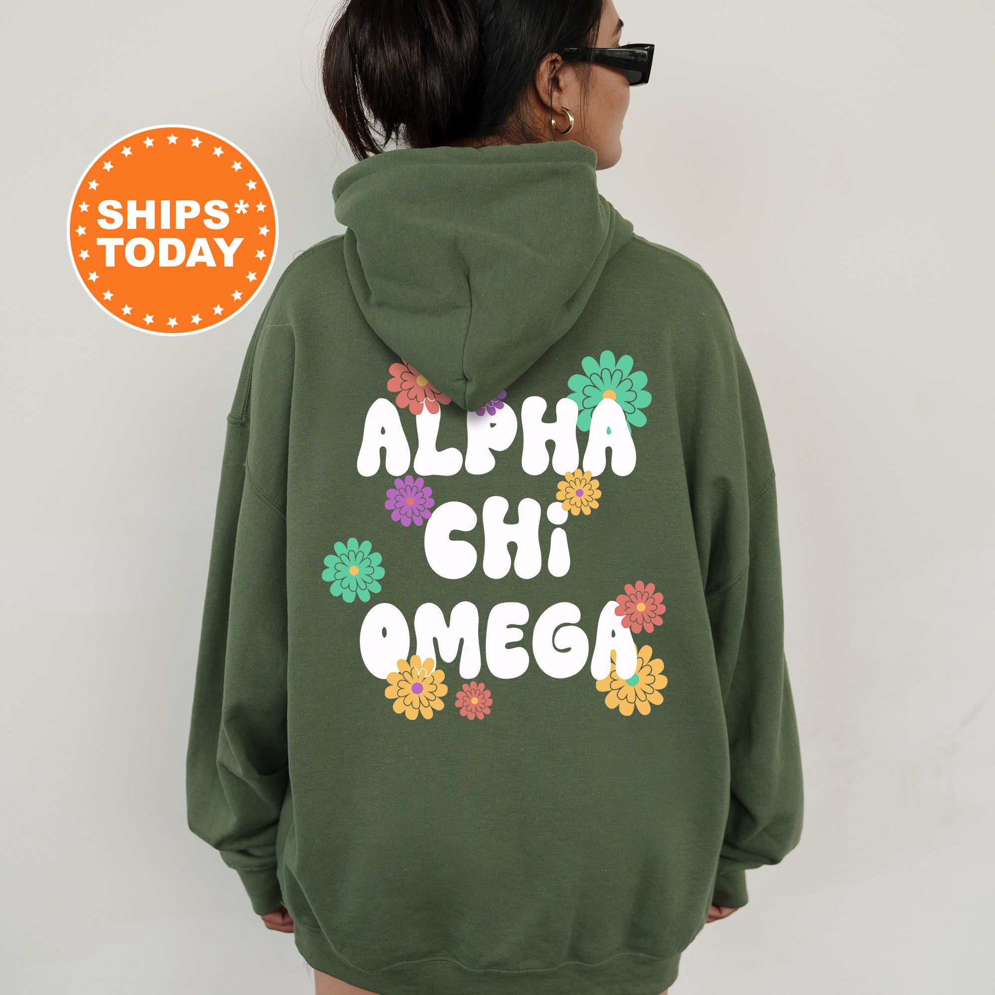 a woman wearing a green hoodie with the words aloh chii omeg