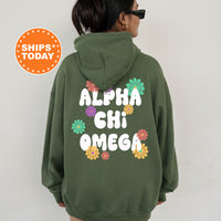 a woman wearing a green hoodie with the words aloh chii omeg