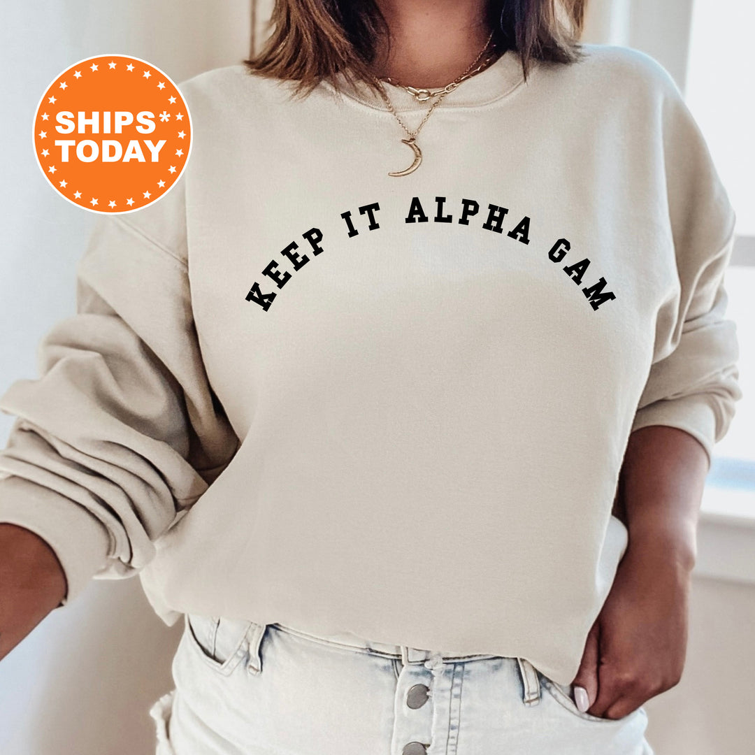a woman wearing a sweatshirt that says keep it aloragan