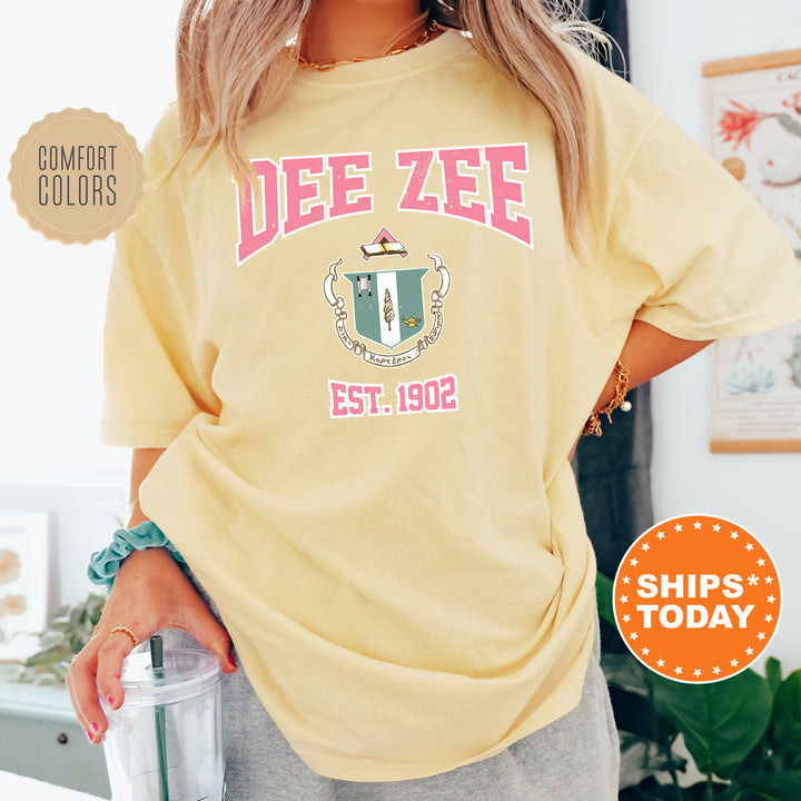 a woman in a yellow shirt holding a blender