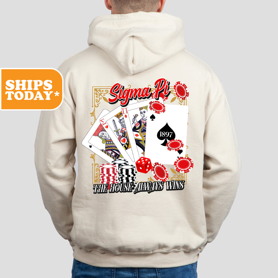 a man wearing a white hoodie with a picture of a playing card on it