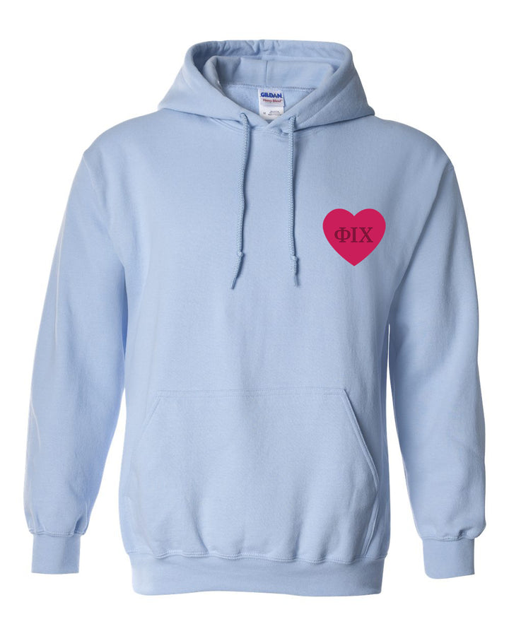 a light blue hoodie with a red heart on it