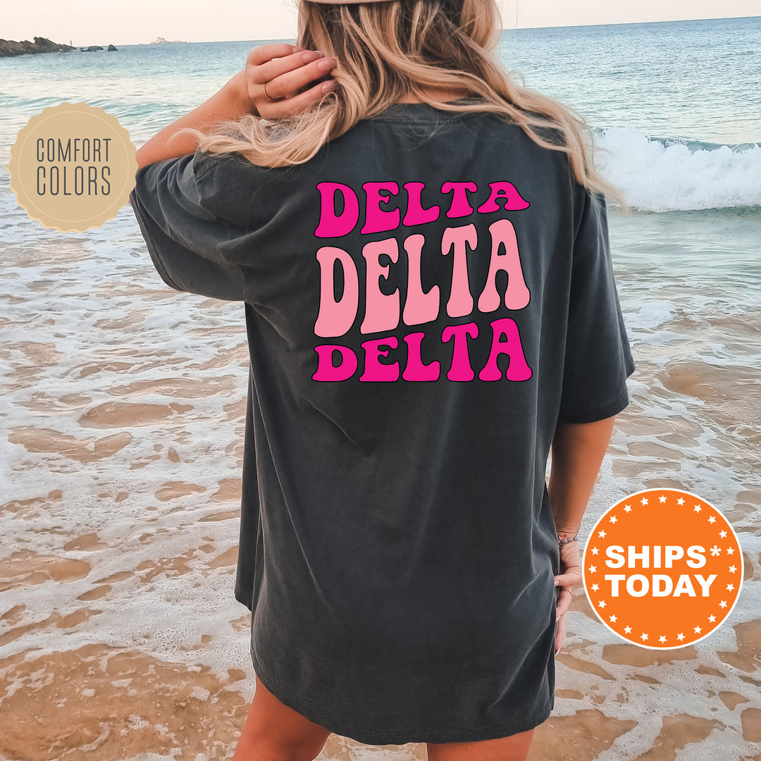 the back of a woman's shirt that says delta delta