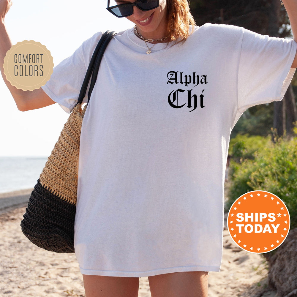 a woman wearing a white shirt with the words alpha chi on it