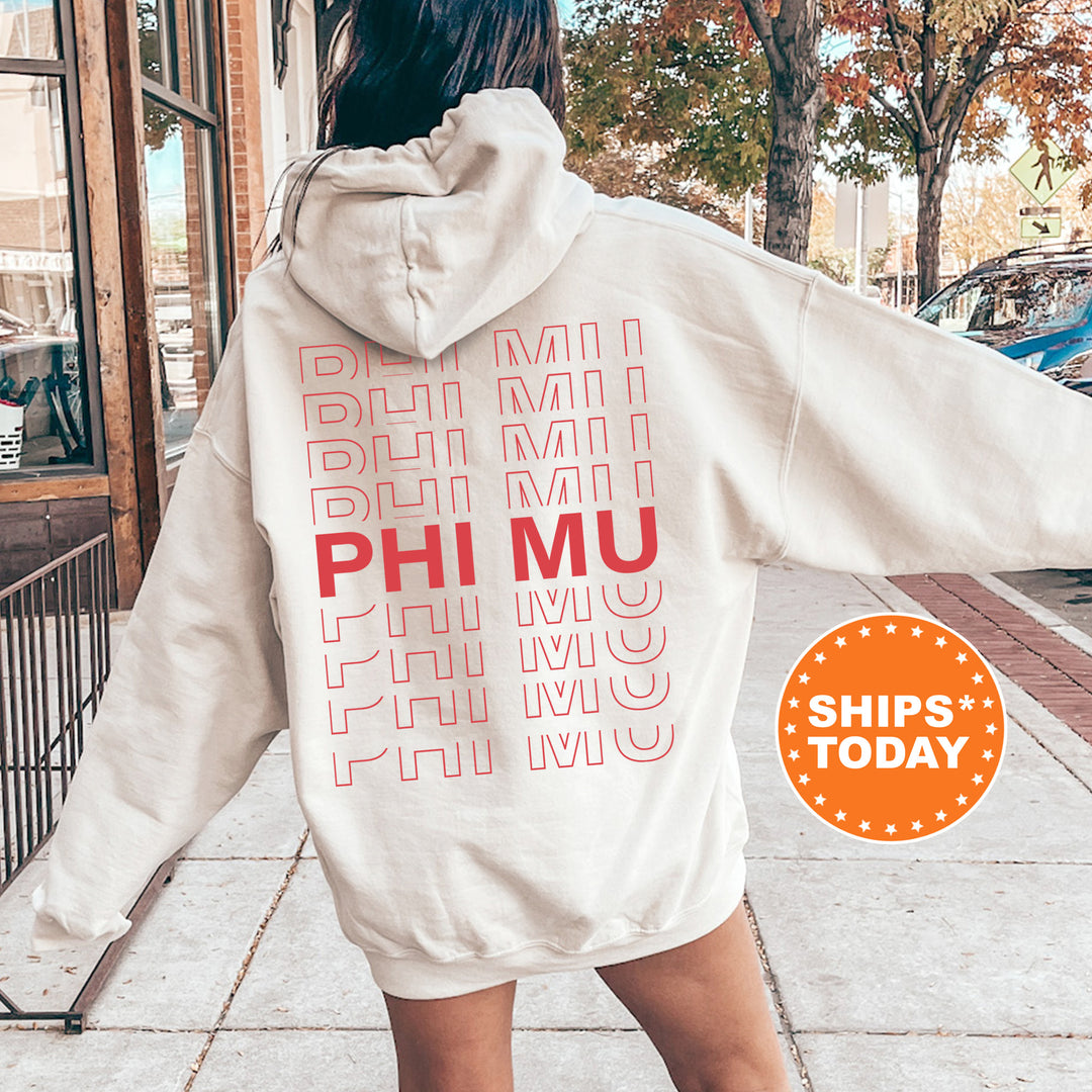 a woman in a white hoodie is walking down the street