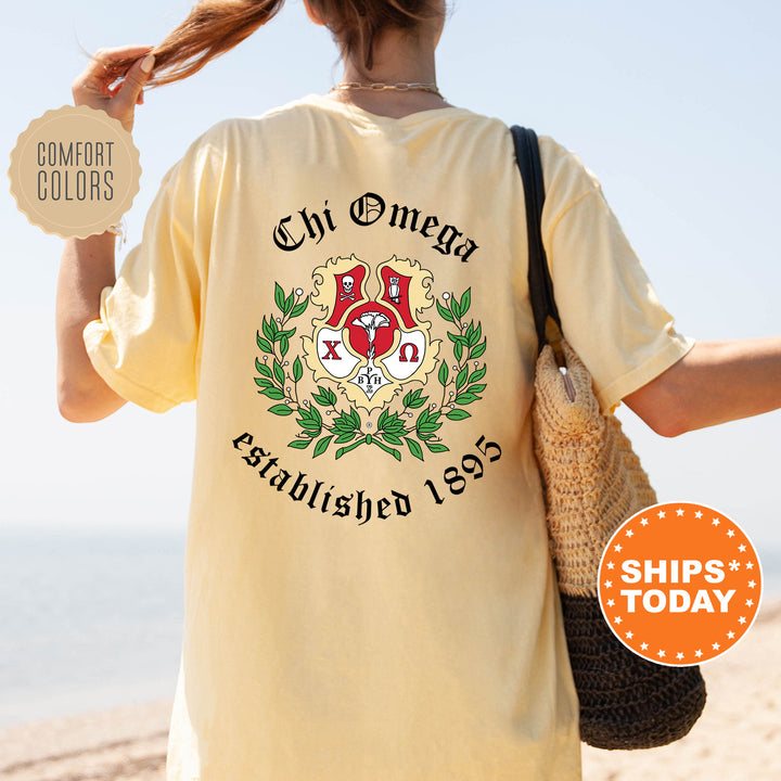 a woman with a bag and a t - shirt that says chi omag established