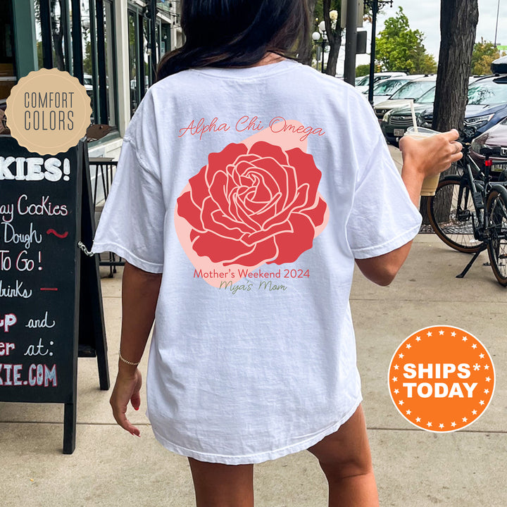 a woman walking down a sidewalk holding a cup of coffee