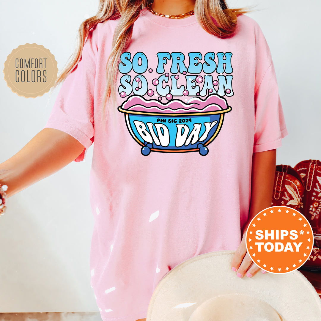 a woman wearing a pink tshirt that says so fresh so clean