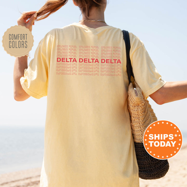 a woman walking on the beach holding a sign that says delta delta