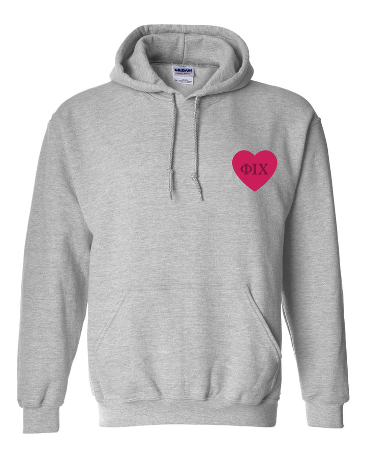 a grey hoodie with a pink heart on it