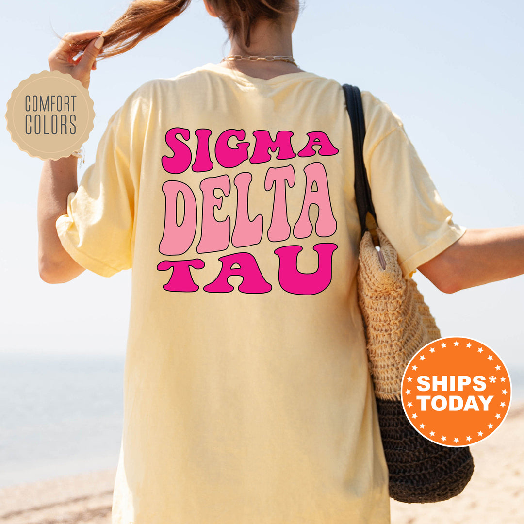 a woman in a t - shirt that says sigma delta tau