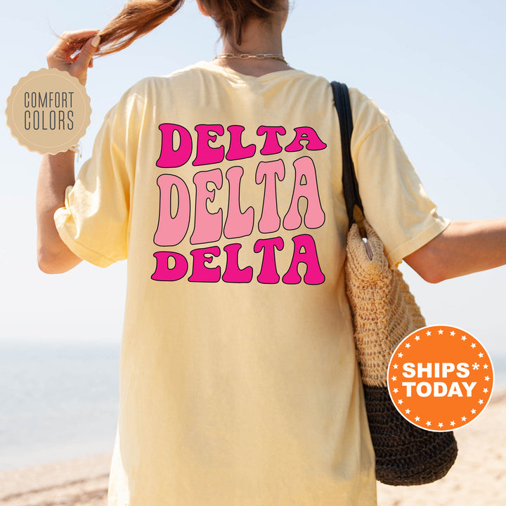 a woman in a t - shirt that says delta delta