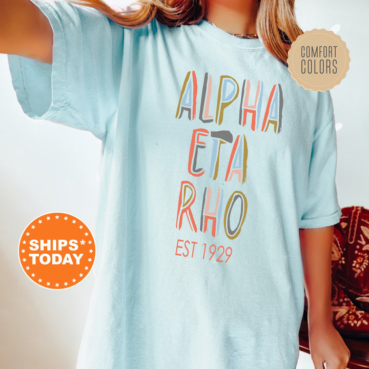 Alpha Eta Rho Pastel Stencil Coed T-Shirt | AHP Fraternity Shirt | Honor House Shirt | Bid Day Gift | Greek Apparel | Comfort Colors _ 8830g