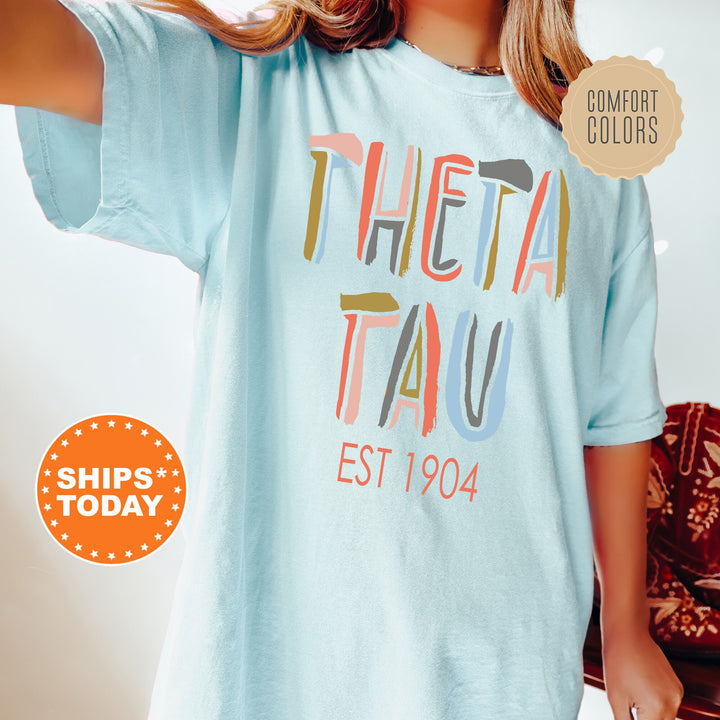 Theta Tau Pastel Stencil Coed T-Shirt | Theta Tau Comfort Colors Shirt | Bid Day Gift | Custom Greek Apparel | Honor Society Shirt _ 8845g