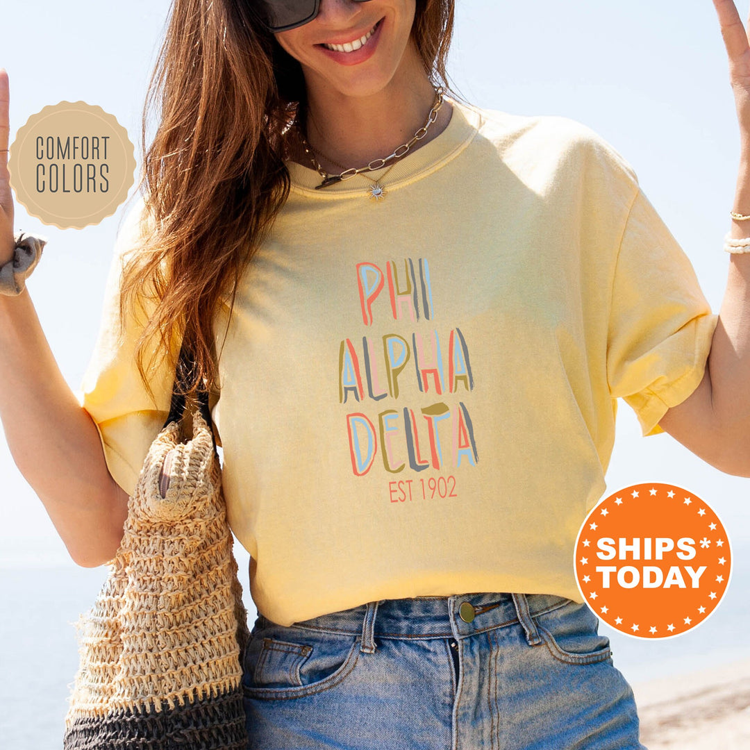 Phi Alpha Delta Pastel Stencil Coed T-Shirt | Phi Alpha Delta Shirt | Law Fraternity Shirt | Greek Apparel | Comfort Colors Shirt _ 8839g