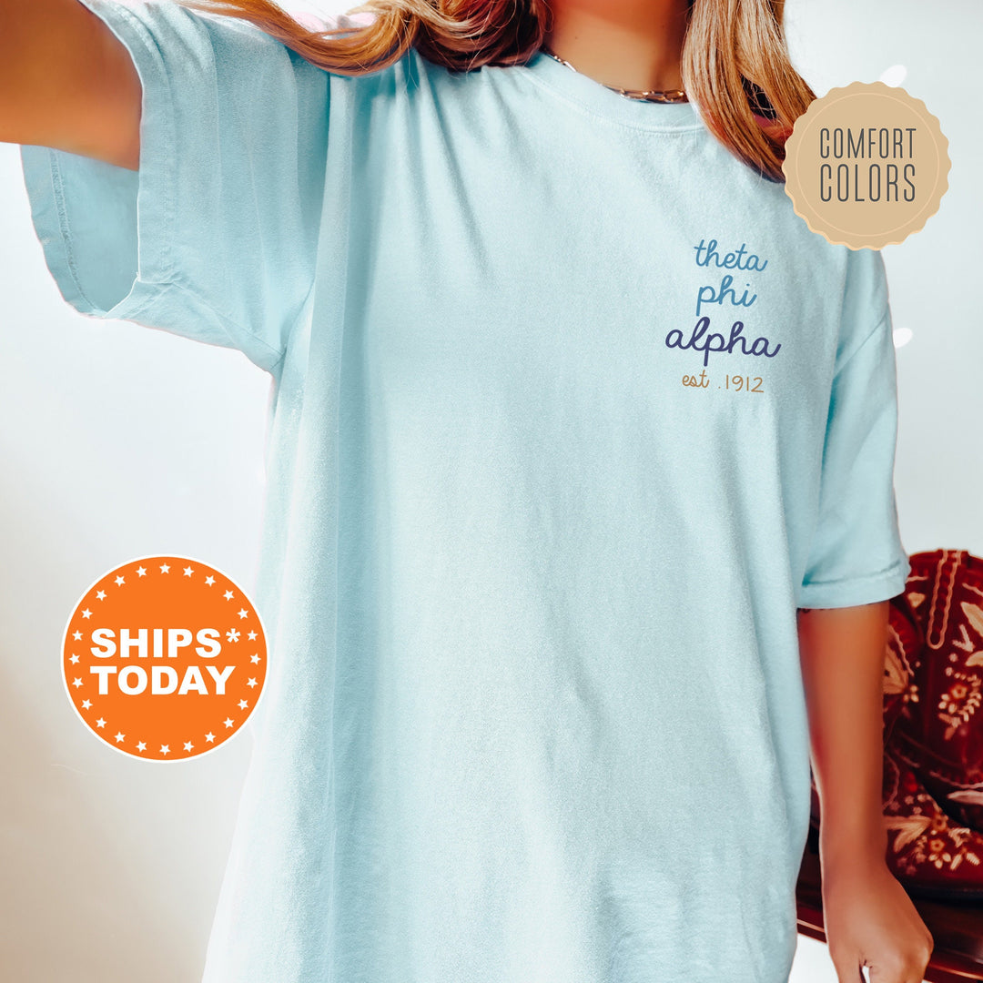 Theta Phi Alpha Blue Cursive Sorority T-Shirt | Theta Phi Comfort Colors Shirt | Left Pocket Graphic Tee | Big Little Reveal Gift _ 17813g