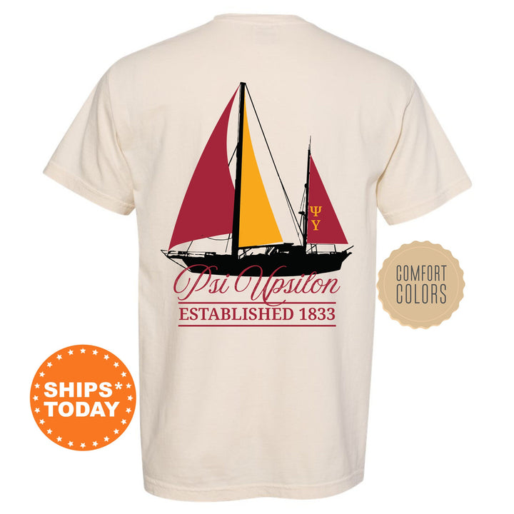 a white shirt with a sailboat on it