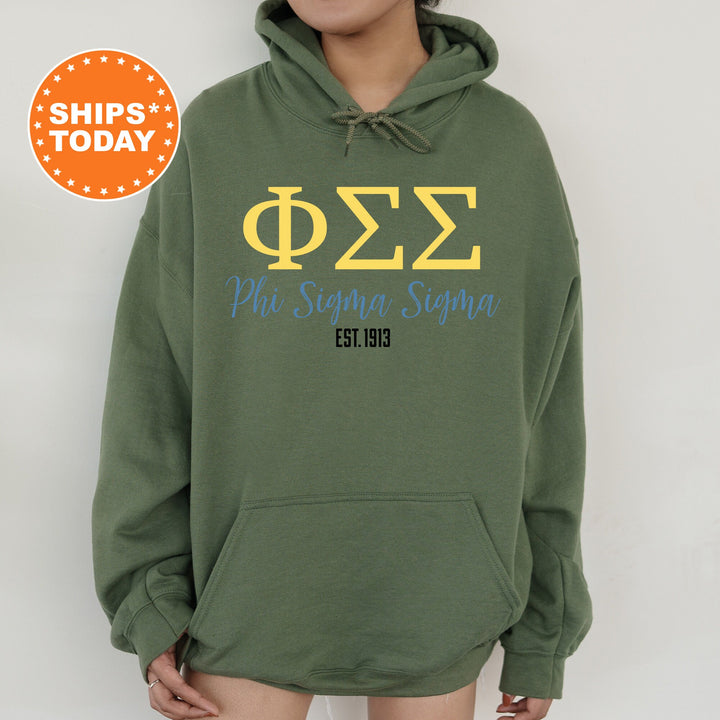 a person wearing a green hoodie with greek letters on it