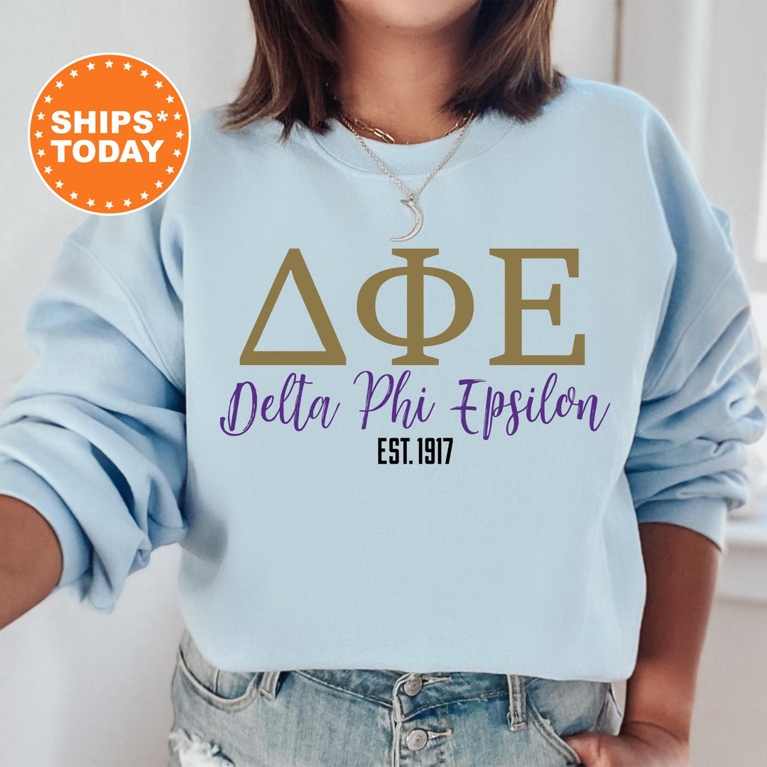 a woman wearing a sweatshirt that says ape delta phi - epsion