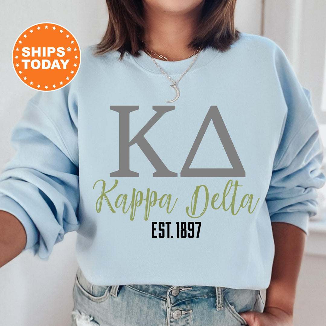 a woman wearing a sweatshirt that says kappa delta