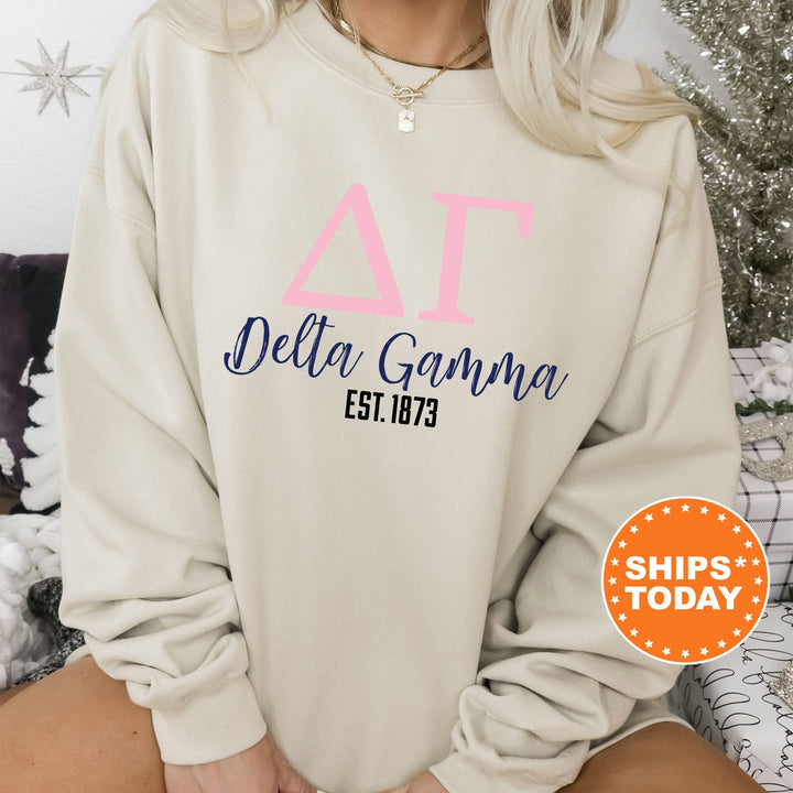 a woman wearing a sweatshirt that says delta gama