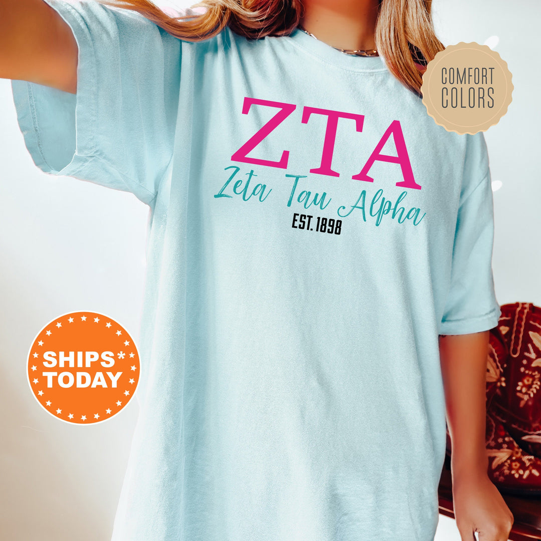a woman wearing a t - shirt that says zta